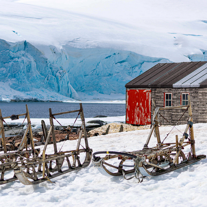 <p>The historic sledges at Port Lockroy today (Credit: gpils27/Shutterstock)</p>